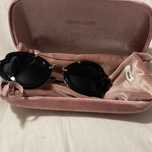 Black Miu Miu cat eye sunglasses